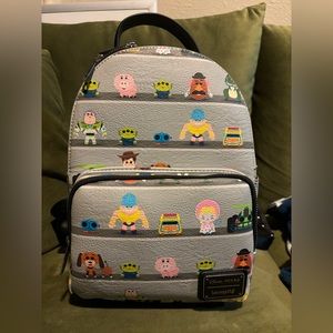 Loungefly multicolor Pixar Toy Story characters on shelf